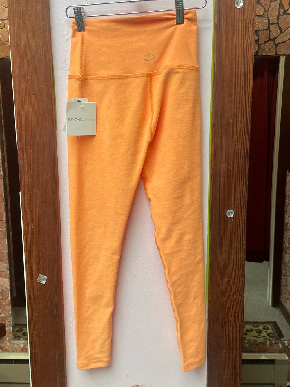 Beyond Yoga Peach-Orange High-Waist Leggings